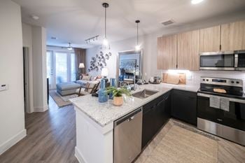 Open floorplan kitchen with island and updated appliances